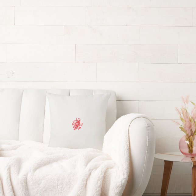 a drawing of a red flower on a white background cushion (Couch)