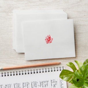 a drawing of a red flower on a white background envelope