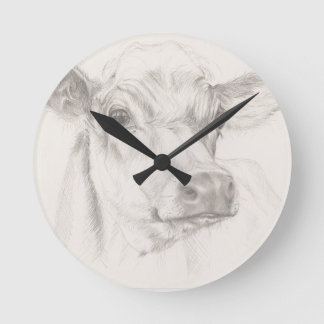 A drawing of a young cow round clock