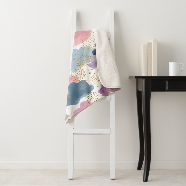 A dreamy watercolor clouds sherpa blanket (In Situ)