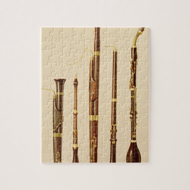 A dulcian, an oboe, a bassoon, an oboe da caccia a jigsaw puzzle (Vertical)