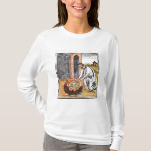 A European engaged in making a reliquary T-Shirt