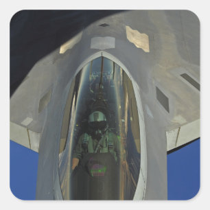 A F-22 Raptor receives fuel from a KC-135 Square Sticker