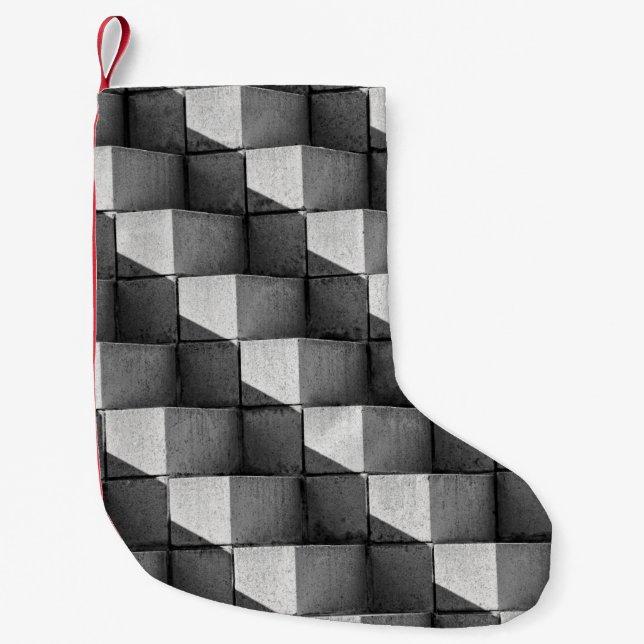 A face of the "Four Sided Pyramid" sculpture in th Small Christmas Stocking (Front)