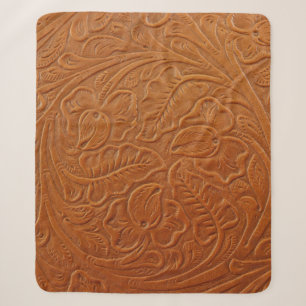 A fancy tan brown light coloured background made o sherpa blanket