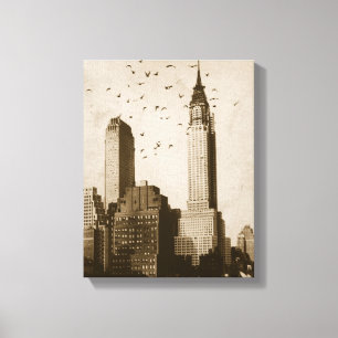 A flock of birds flying canvas print