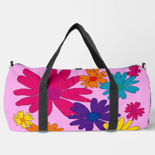 A floral bed of daisy flowers  duffle bag