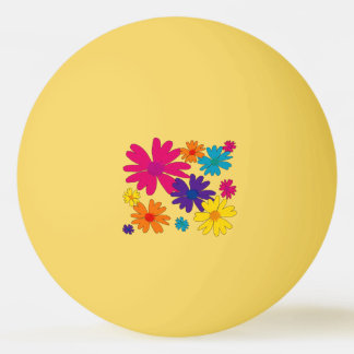 A floral bed of daisy flowers  ping pong ball
