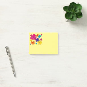 A floral bed of daisy flowers  post-it notes