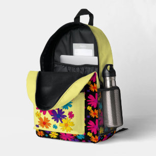 A floral bed of daisy flowers  printed backpack