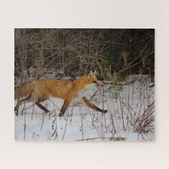 A fox strolling through the snow on a wintry day jigsaw puzzle (Horizontal)