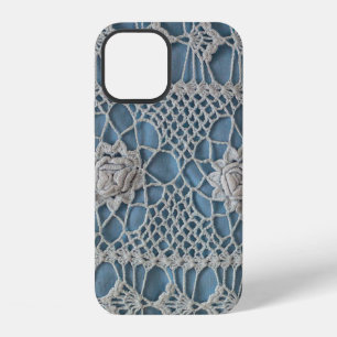 A fragment of a wide lace insert contains small wh iPhone 12 case