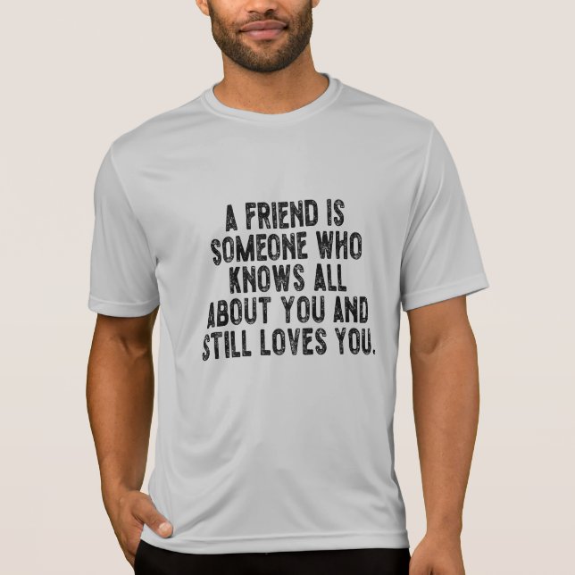A friend is someone who knows all about you and st T-Shirt (Front)