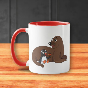 A friendly seal and a penguin cartoon mug