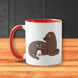A friendly seal and a penguin cartoon mug