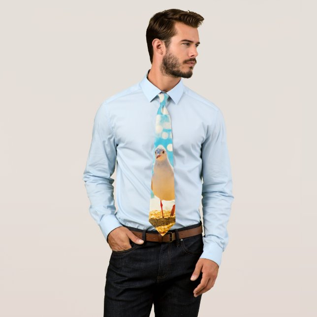 A fun design with a seagull on a beach background. tie (In Situ)