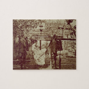 A Geisha being carried in a litter (sepia photo) Jigsaw Puzzle