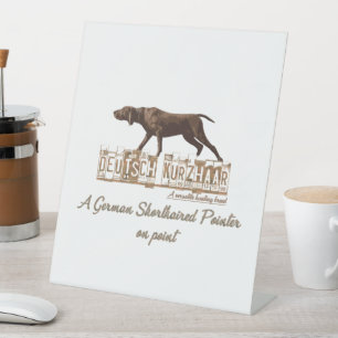 A German Shorthaired Pointer on point  Pedestal Sign