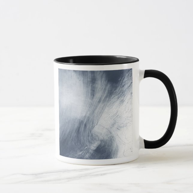 A giant whirlpool cloud swirls above the sea mug (Right)