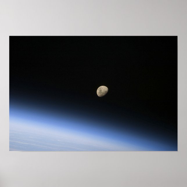 A gibbous moon visible above Earth's atmosphere Poster (Front)