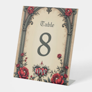 A gothic romance. An ornate, gothic-style  Pedestal Sign