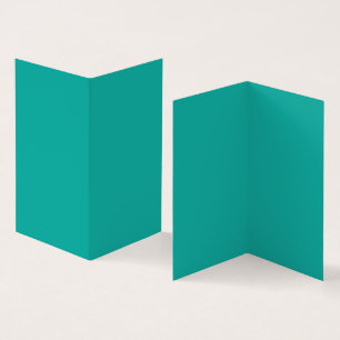 A gradient background blending blue into green.