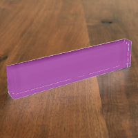A gradient background blending shades of pink and 