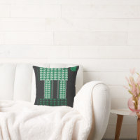 a green and black pattern with a tree in the middl