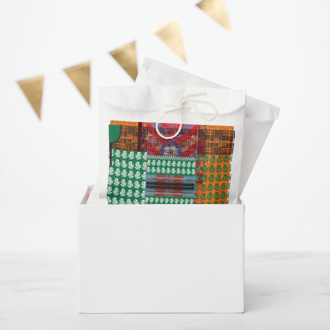 a green and black pattern with a tree in the middl favour bags (Party)