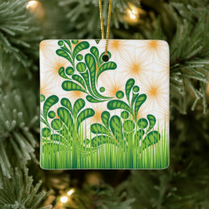 A green and gold artistic pattern depicting a tree ceramic ornament
