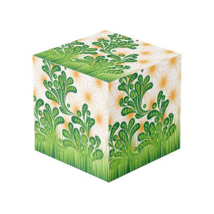 A green and gold artistic pattern depicting a tree cube