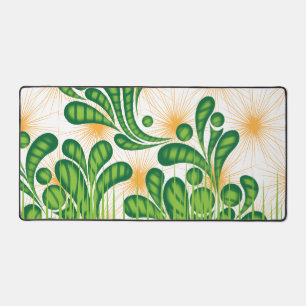 A green and gold artistic pattern depicting a tree desk mat