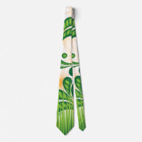 A green and gold artistic pattern depicting a tree
