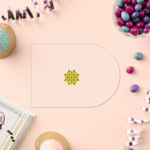 a green and red flower with black dots acrylic invitations