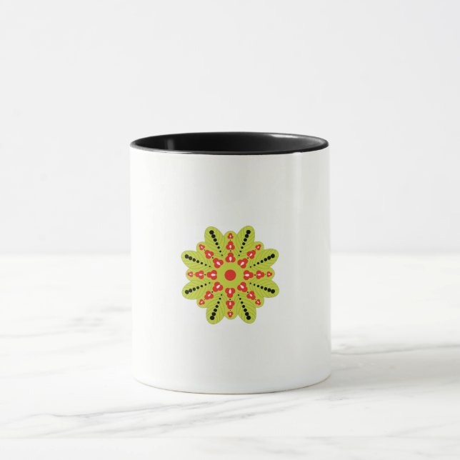 a green and red flower with black dots mug (Center)