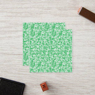 a green and white background with small white dots loyalty card