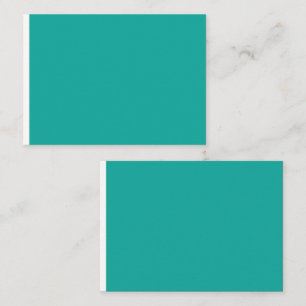 a green background with a  place card