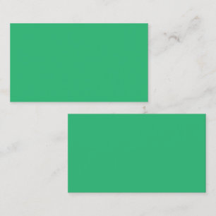 a green background with a white border calling card