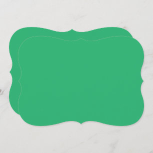 a green background with a white border card