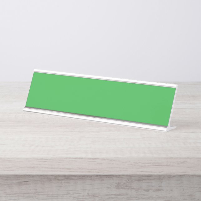 a green background with a white border desk name plate (Front)