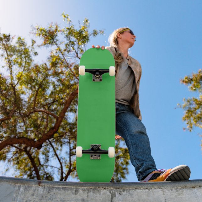 a green background with a white border skateboard (Outdoor 1)