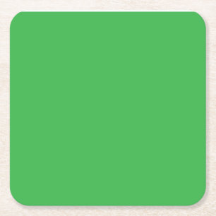a green background with a white border square paper coaster