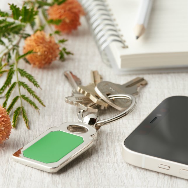 a green screen with a white background key ring (Side)