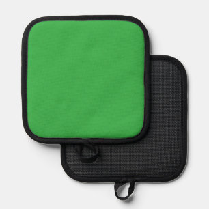a green screen with a white background pot holder