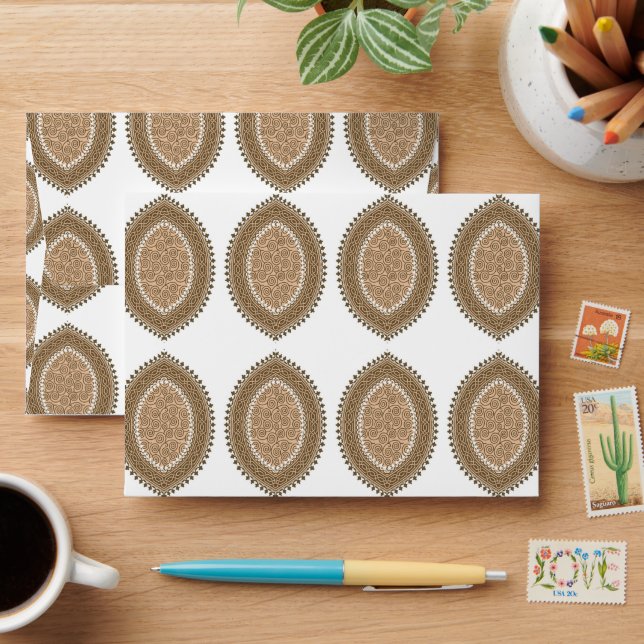 a group of brown circles on a white background envelope (Desk)