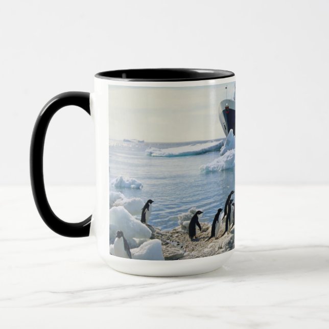A Group Of Penguins Standing On An Icy Beach Mug (Left)