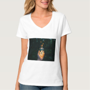A hand holding a bottle of light in night T-Shirt