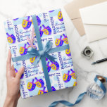 A Hanukkah Dreidels Colourful Pattern Personalised Wrapping Paper<br><div class="desc">This colourful Hanukkah Dreidels pattern wrapping paper is personalised with your name and short message. Easy to customise, this one of a kind Dreidel gift wrap features my original artwork, two spinning tops in vibrant shades of blue, purple, pink and yellow for an unexpected bit of fun. Set on a...</div>