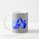 A Hanukkah Dreidels In Blue Kids Add Your Name Fun Coffee Mug<br><div class="desc">This fun Hanukkah mug in vibrant blues against a faux silver background makes a fun gift for kids... and adults. Add your name to this holiday mug using the easy text template, or clear the wording if you like your mugs without text. The original double Dreidel design showing all four...</div>