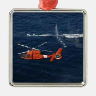 A helicopter crew trains metal tree decoration